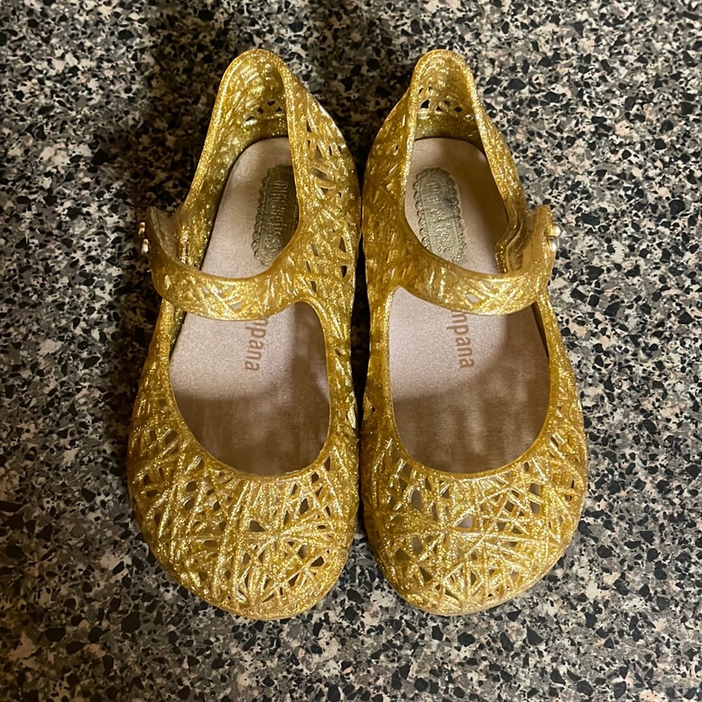Gold sparkly mini Melissa shoes